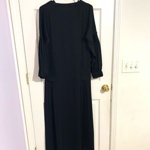 Abaya: New without the tag. It never have been worn